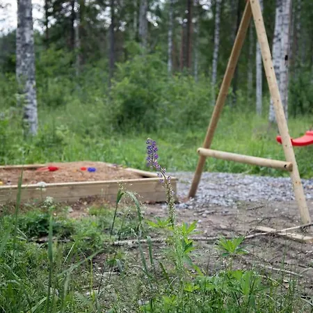 Ihana Järvenranta Mökki. By The Lake. Huvilat *